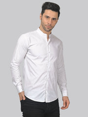 a man wearing a white shirt and black pants