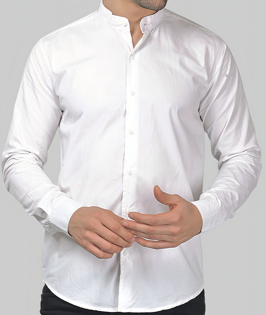 a man wearing a white shirt and black pants