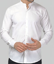 a man wearing a white shirt and black pants