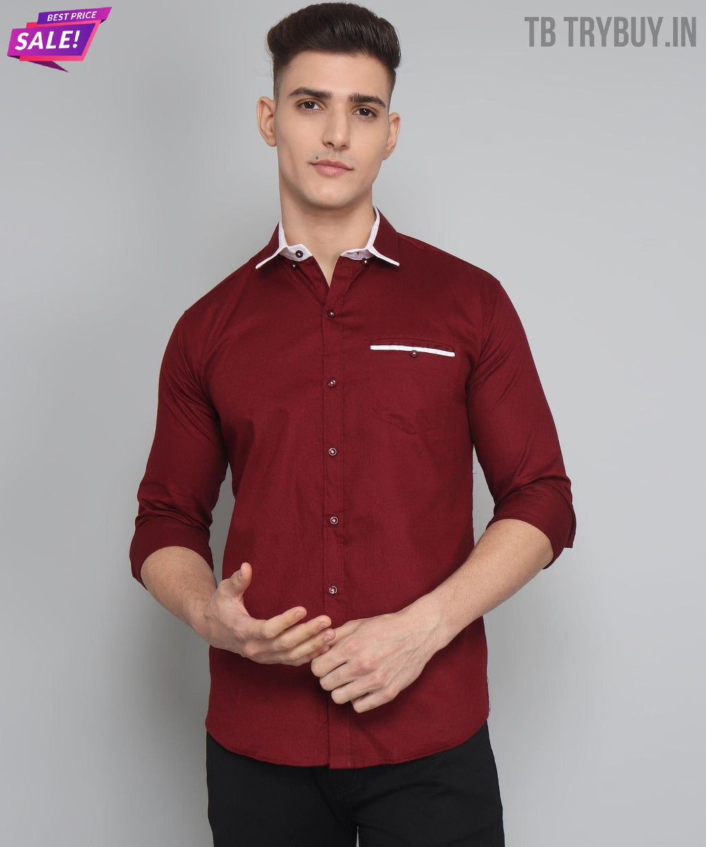 a man wearing a red shirt and black pants