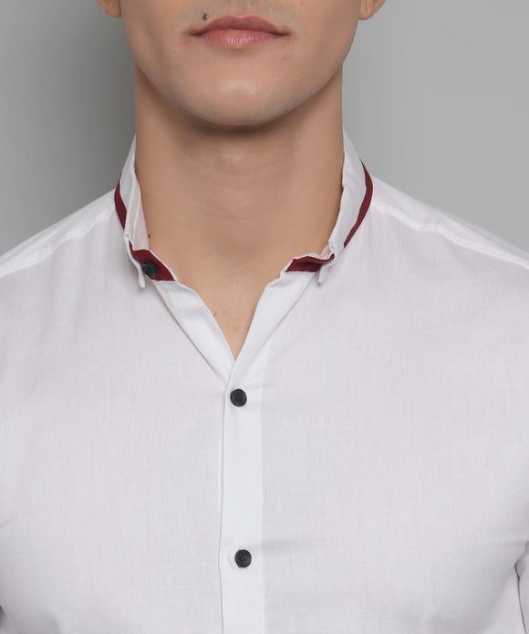 a man wearing a white shirt and a red tie