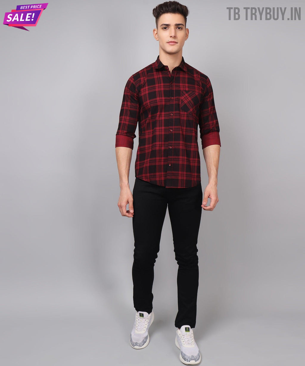 a man in a red and black plaid shirt