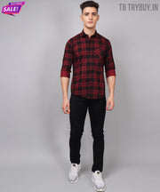 a man in a red and black plaid shirt