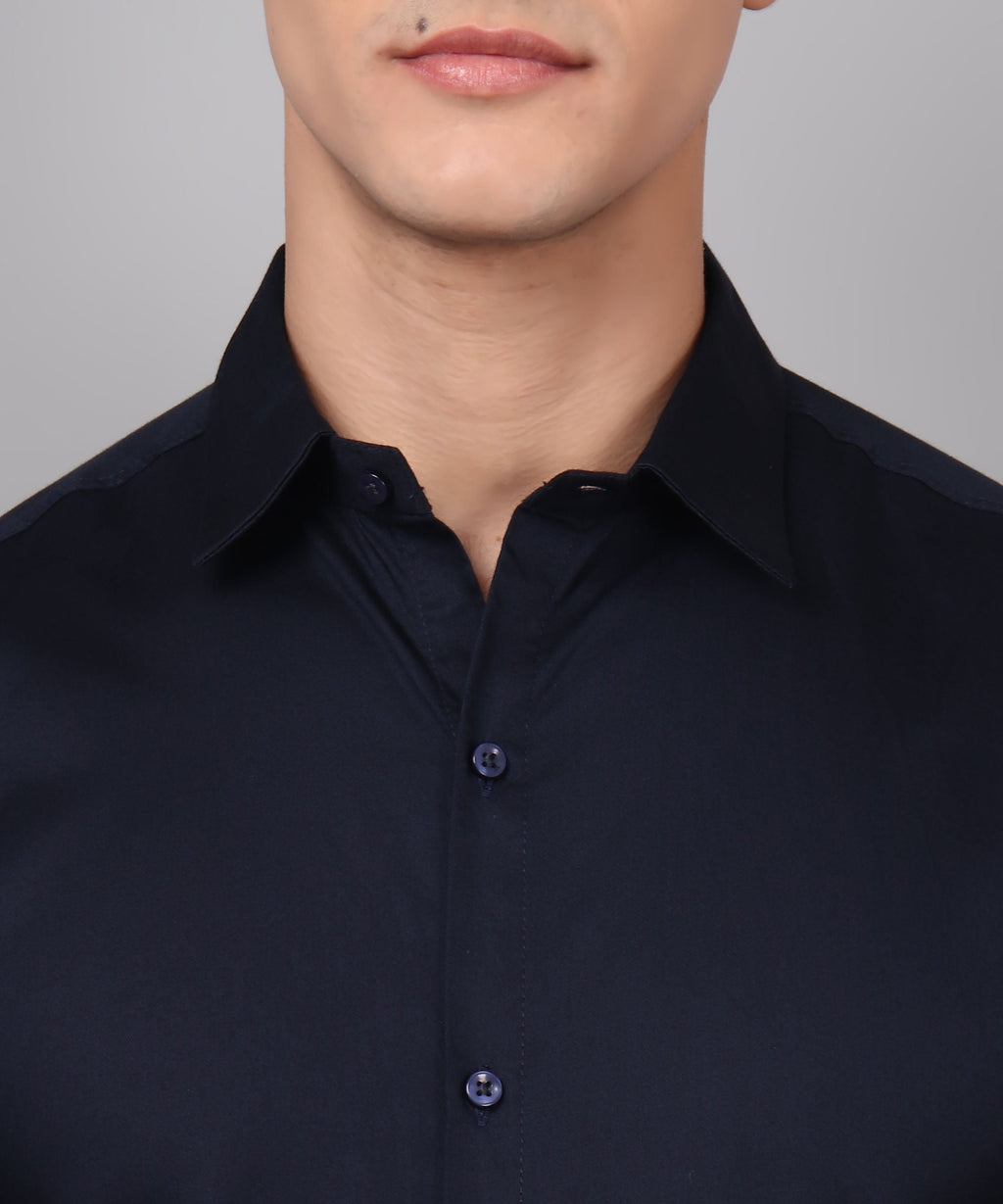 a man wearing a black shirt and glasses