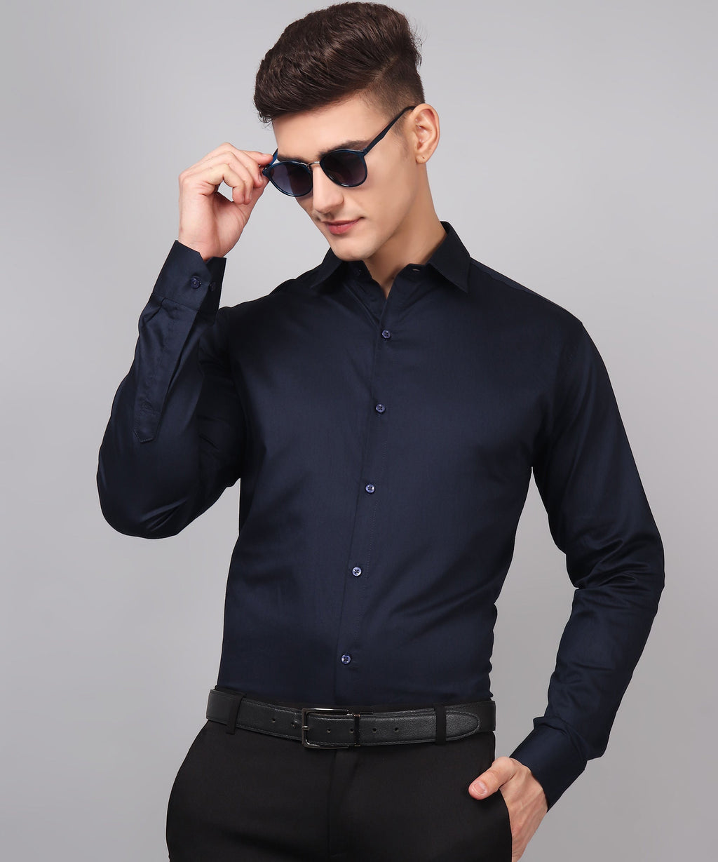 a man wearing a black shirt and sunglasses