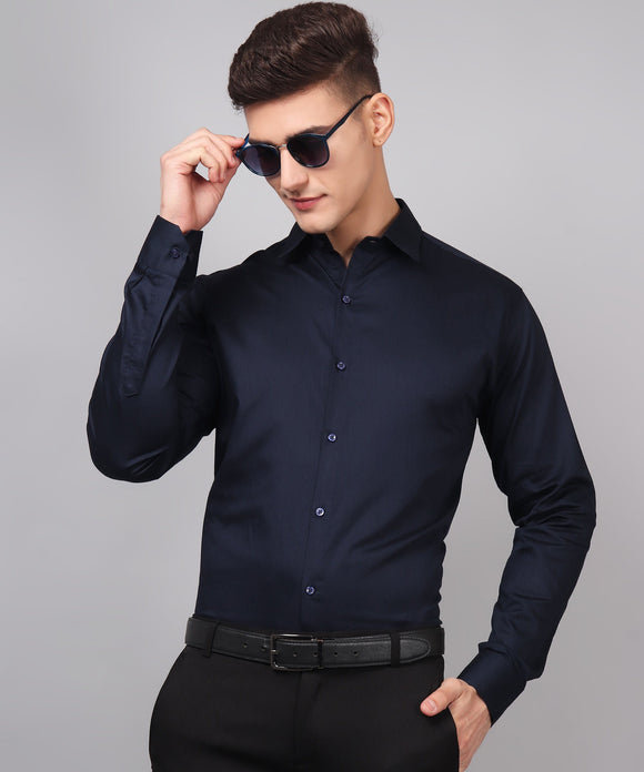 a man wearing a black shirt and sunglasses