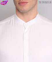 a man wearing a white shirt and glasses