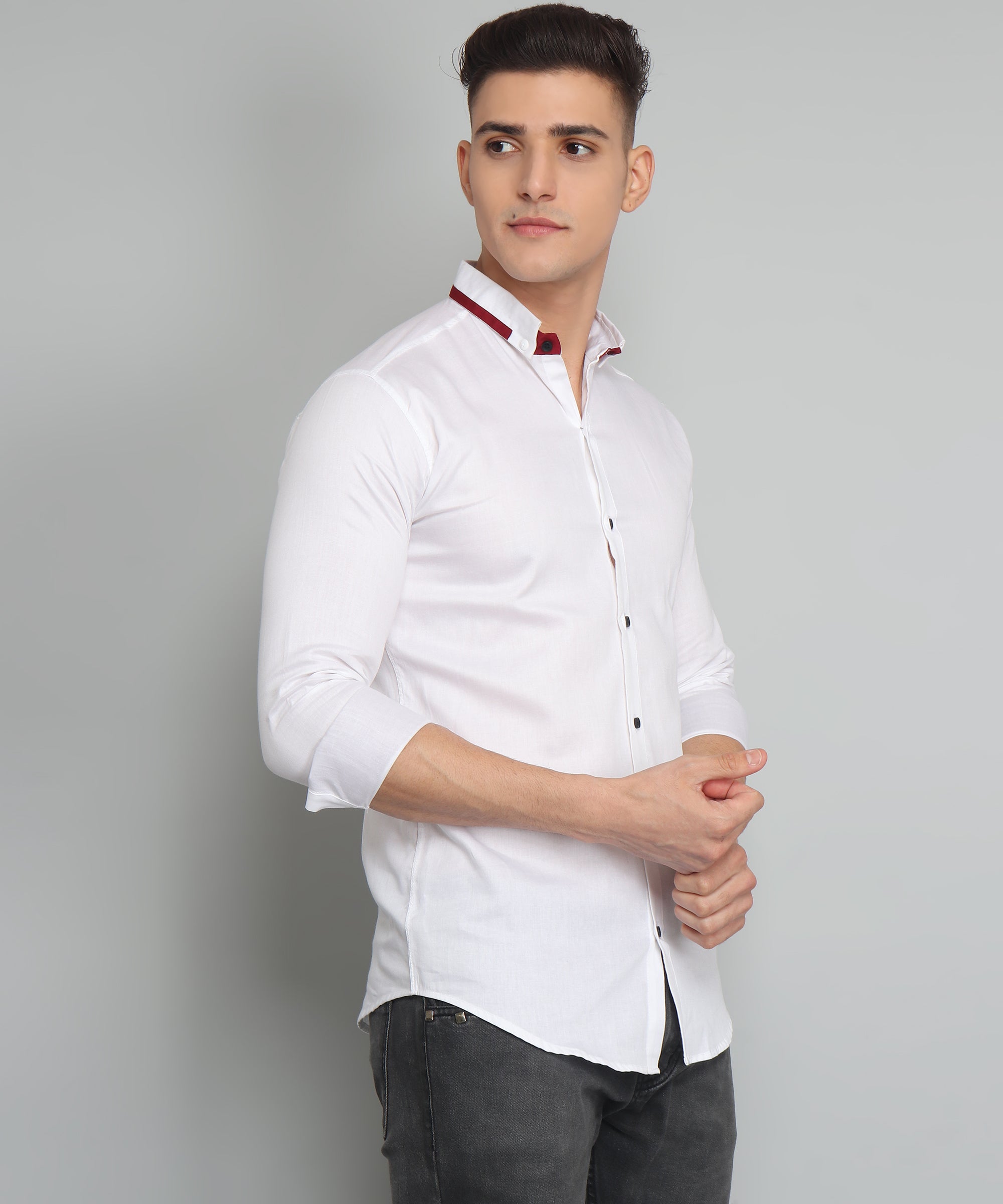 Timeless Elegance: Embracing Classic Style with a Crisp White Cotton Shirt Adorned with a Bold Red Stripe on the Collar