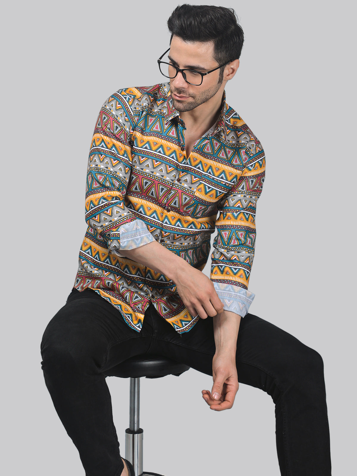 Are Oxford cotton shirts suitable for layering under sweaters or jackets?