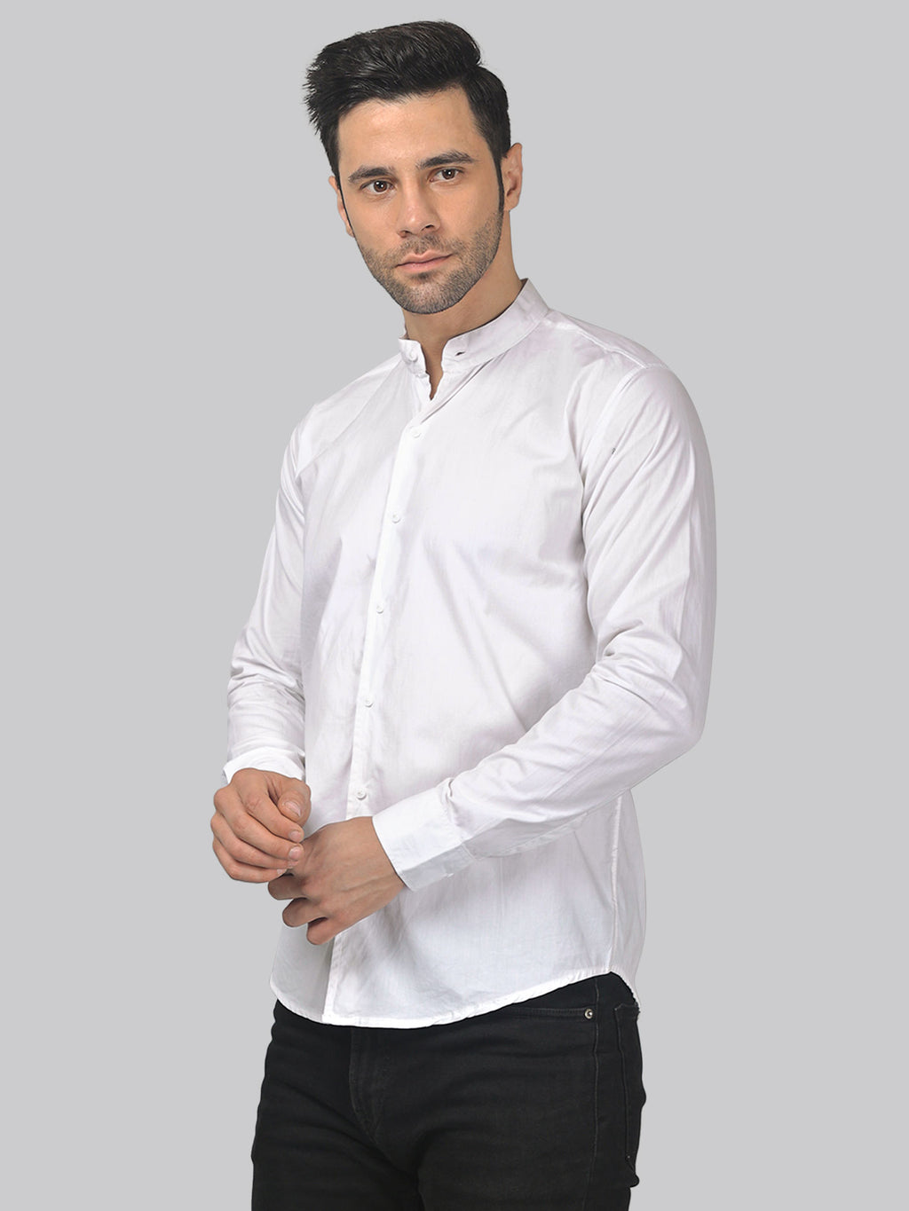 a man wearing a white shirt and black pants