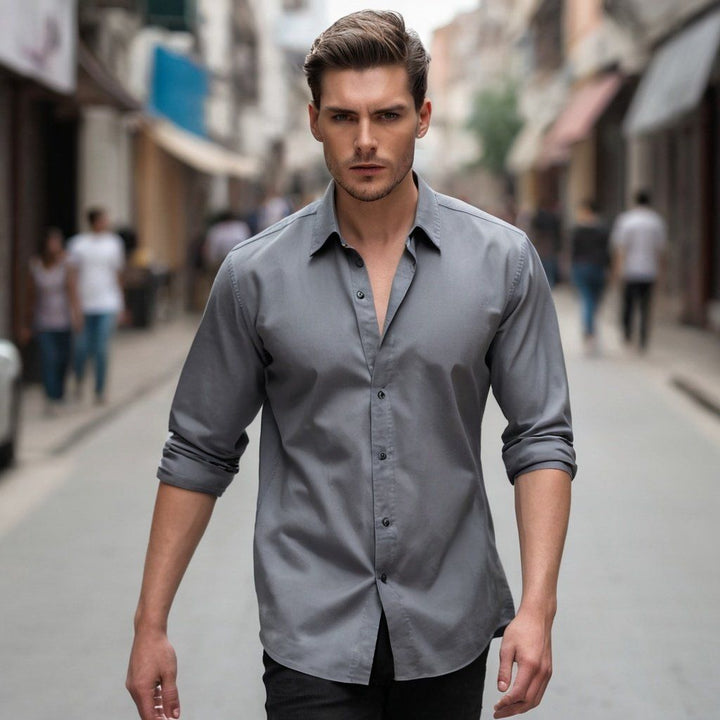 a man walking down a street holding a skateboard