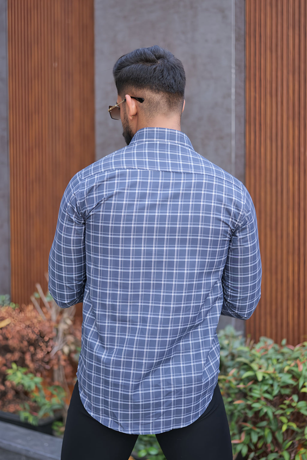 a man with a cigarette in his mouth