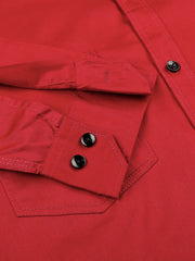 a close up of a red shirt with buttons