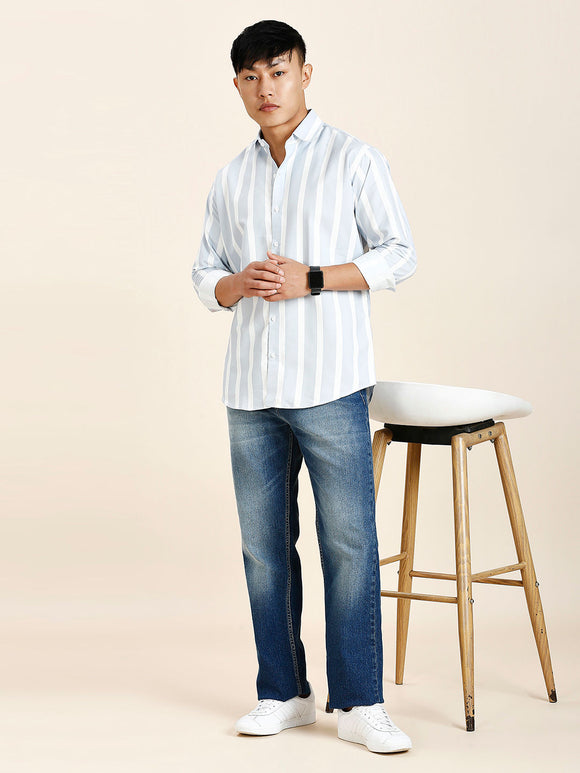 a man standing in front of a stool