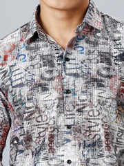 a man wearing a shirt with graffiti all over it