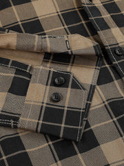 a black and tan checkered shirt with buttons