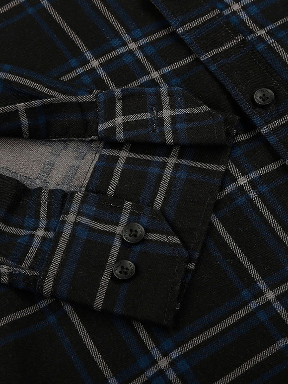 a close up of a black and blue plaid shirt