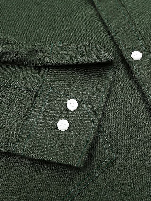 a close up of a green shirt with buttons