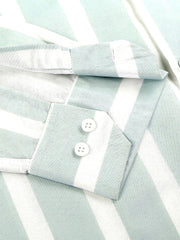 a close up of a striped shirt with buttons