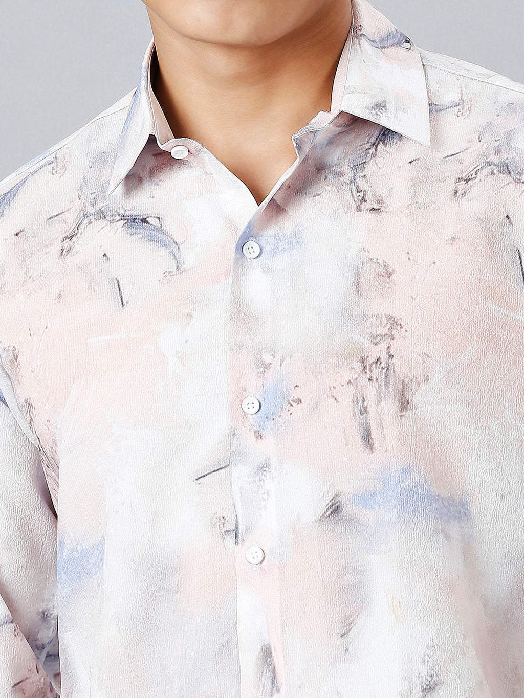 a man wearing a white shirt with a blue tie