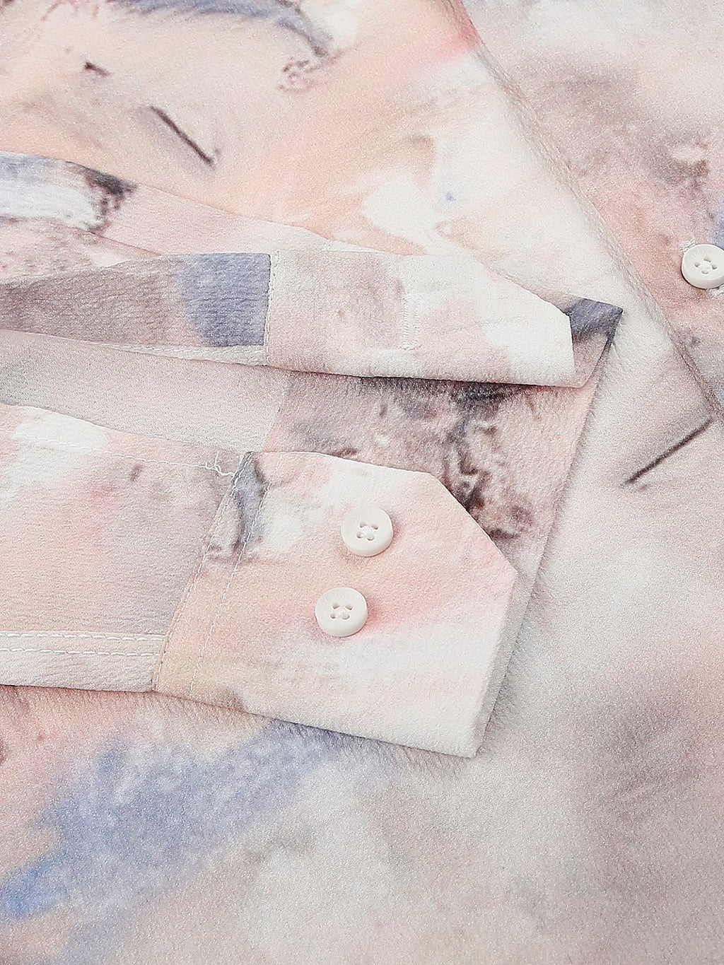 a shirt with a tie dye pattern on it