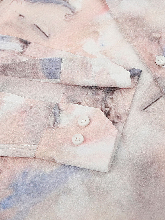 a shirt with a tie dye pattern on it