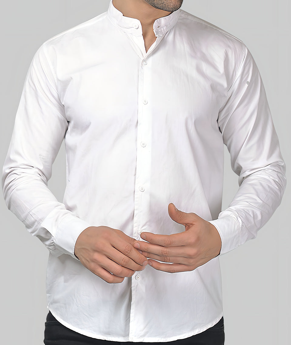 a man wearing a white shirt and black pants