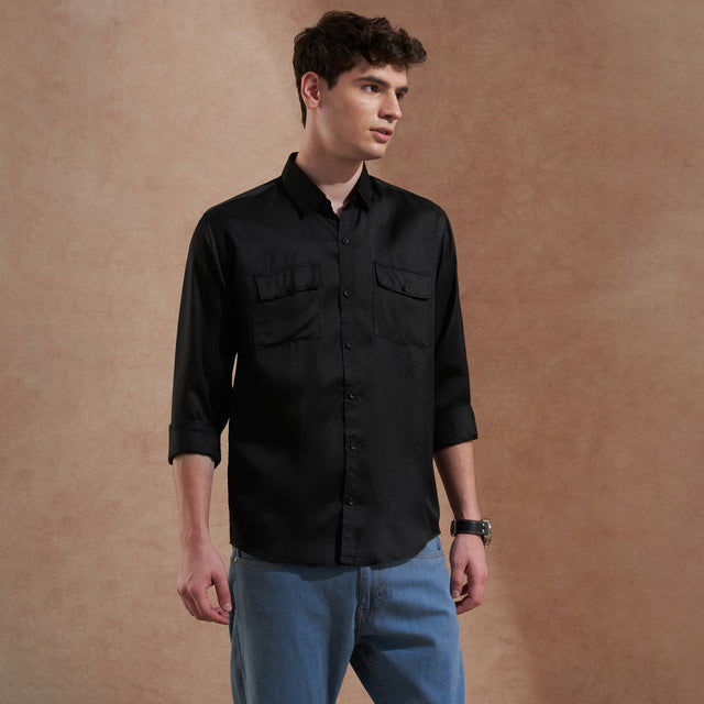 Men's black solid slim-fit shirt with dual flap pockets, product view