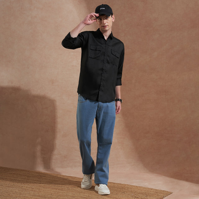 Men's black solid slim-fit shirt with dual flap pockets, product view