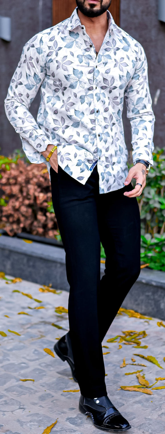 a man wearing a white shirt and black pants