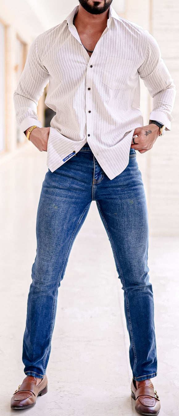 a man standing with his hands on his hips