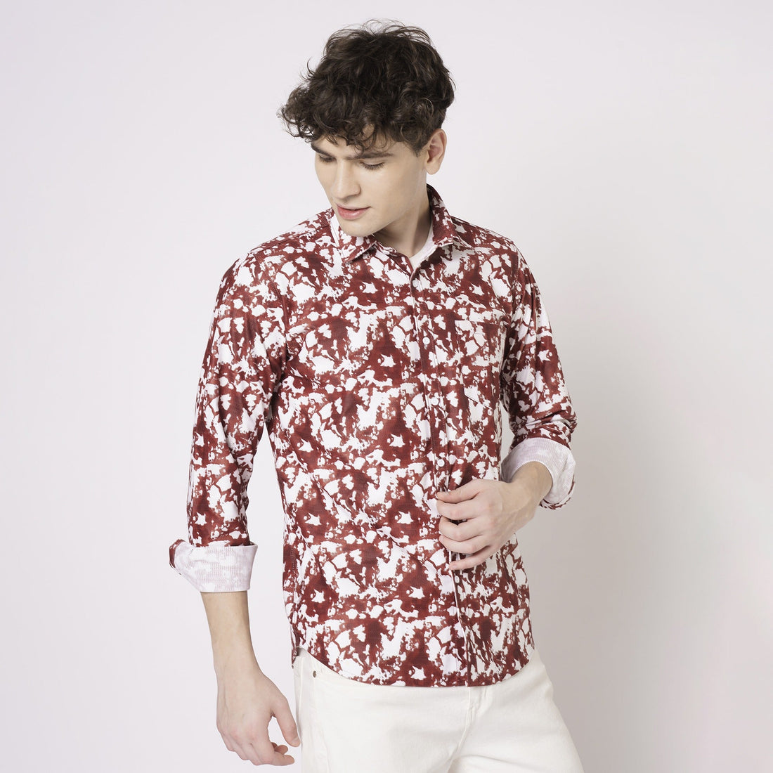 Men's red and white abstract printed shirt angled front view