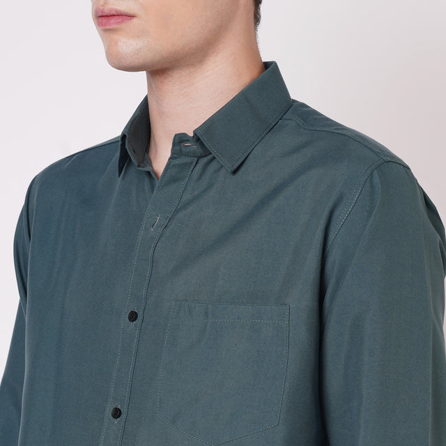 Teal green men's solid shirt collar and chest pocket detail