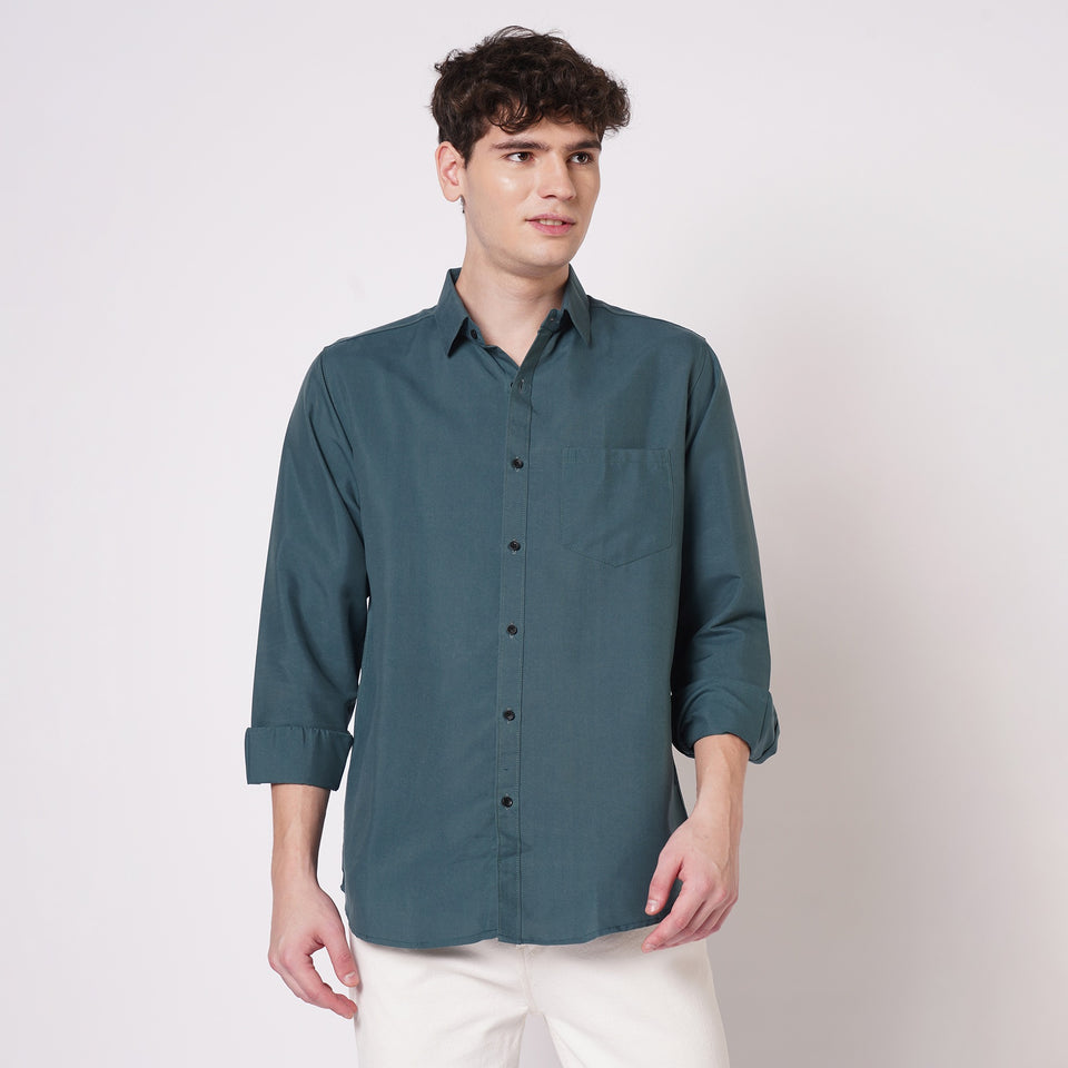 Men's teal green solid shirt front view