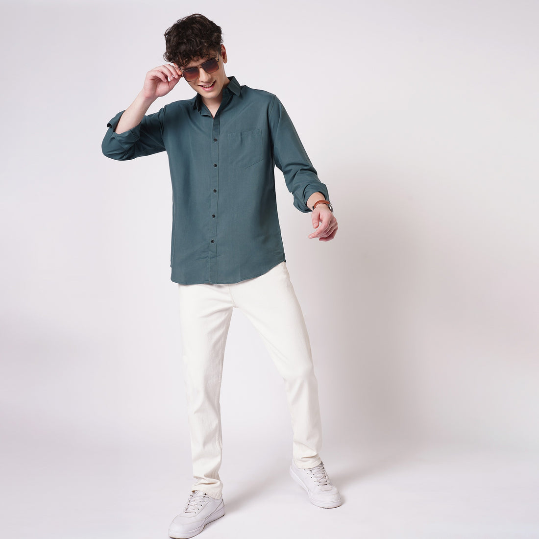 Men's teal green solid shirt full-length styling view