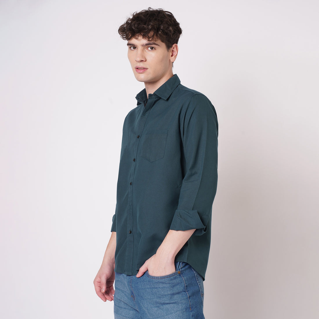 Men's deep teal solid shirt side view
