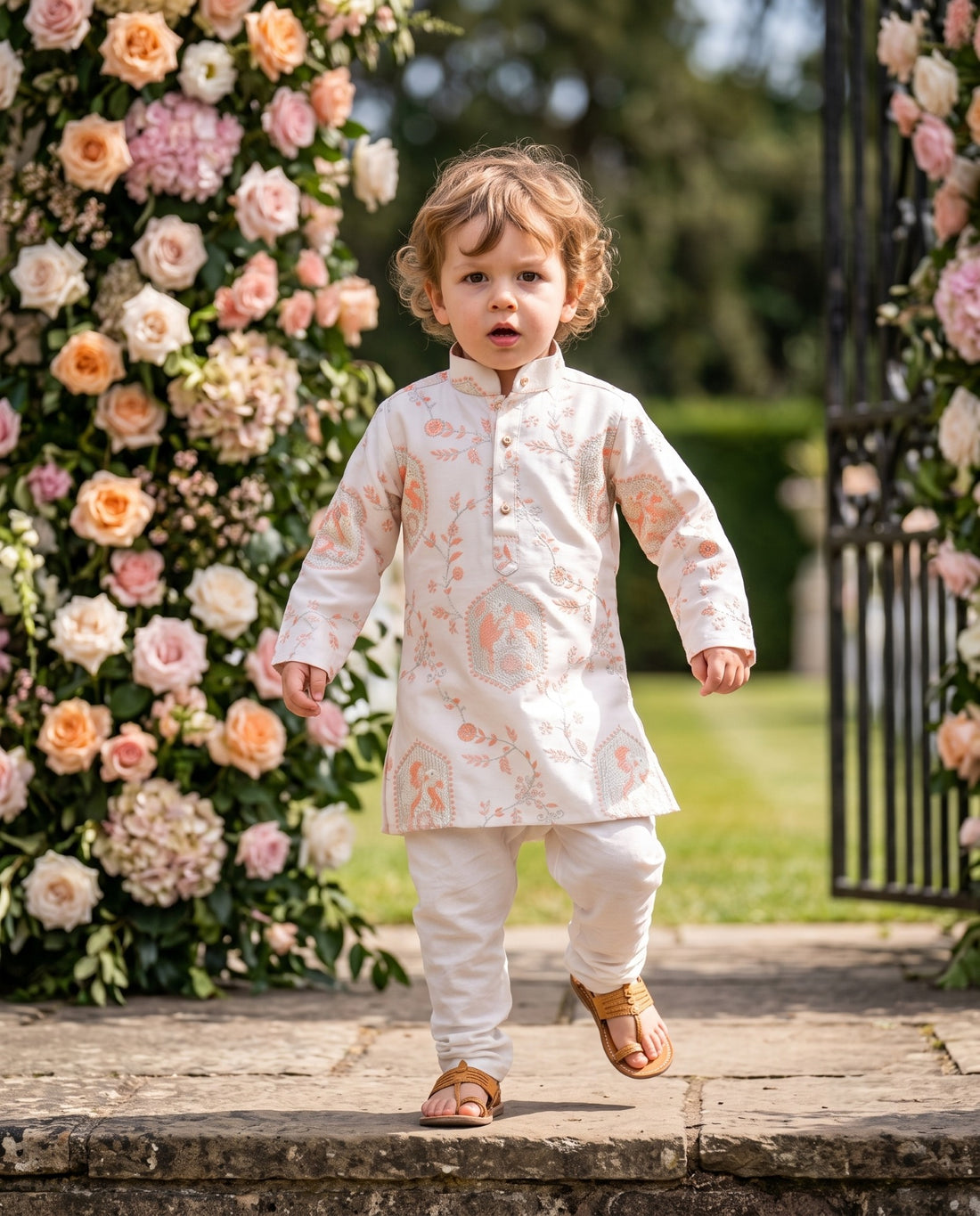 TryBuy boys ivory and peach motif kurta, 2-3 years — garden walking view showing the knee-length silhouette