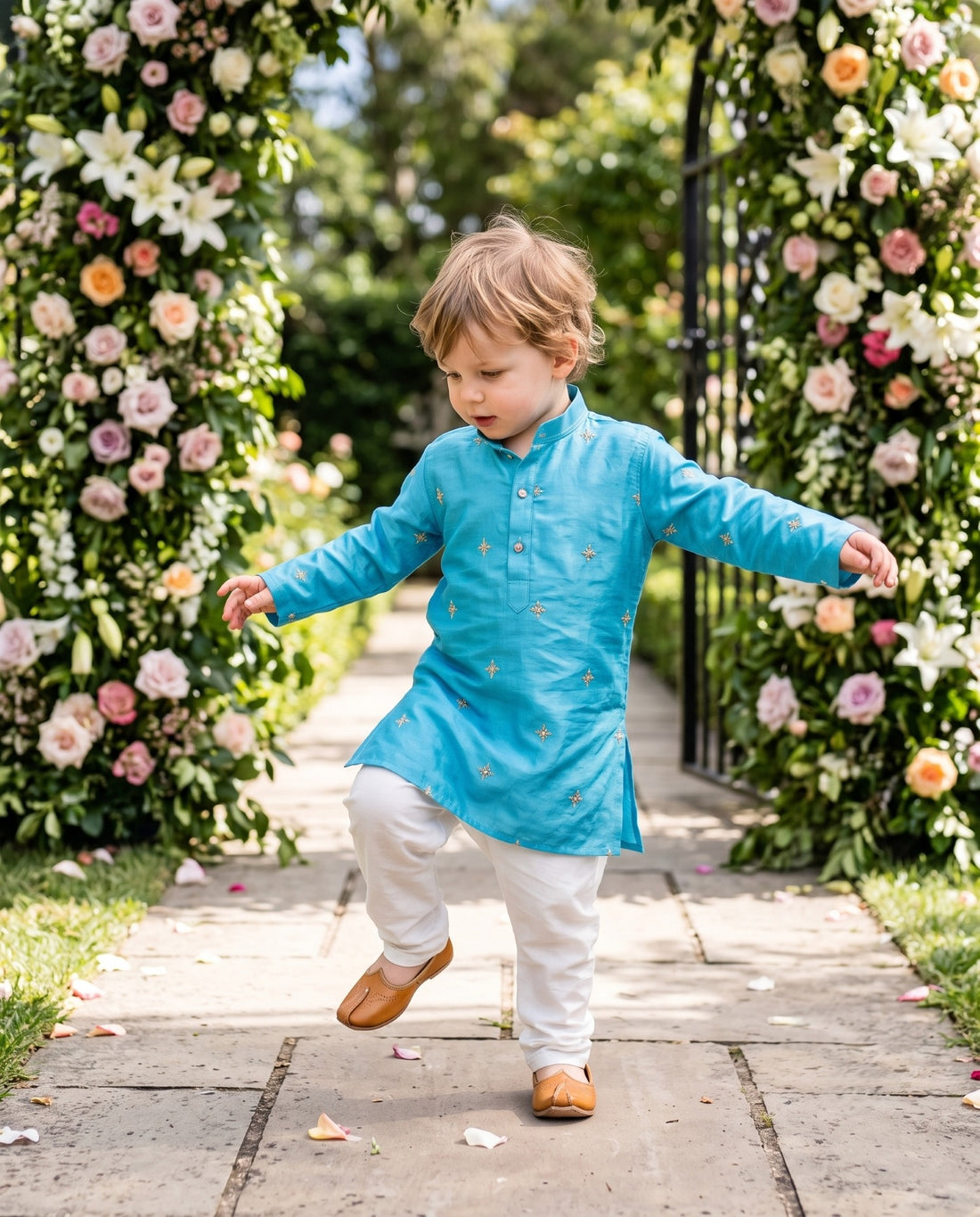TryBuy boys sky-blue long-sleeve embroidered kurta showing side slits in motion