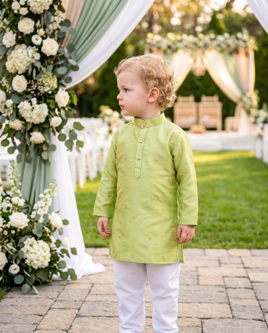 Three-quarter front view of TryBuy lime green embroidered kids kurta with stand collar and tonal buttons