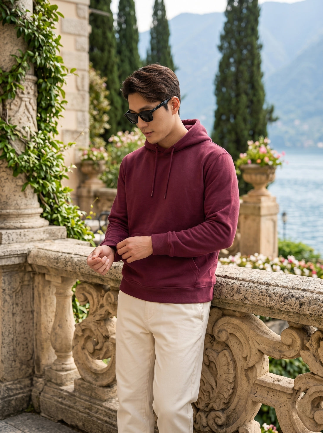 
Men's maroon cotton pullover hoodie, front cuff detail lifestyle view
