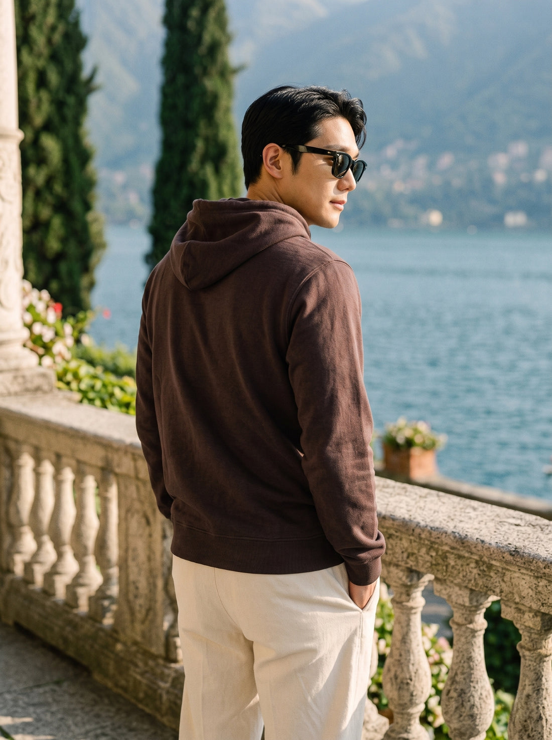 
Men's chocolate brown cotton pullover hoodie, rear three-quarter view
