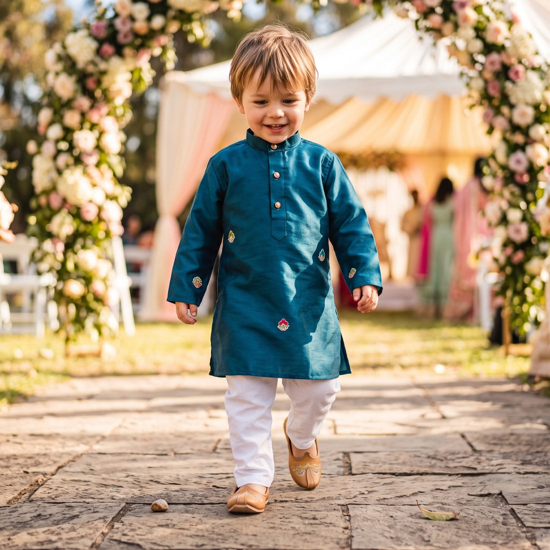 Front walking view of TB_973_KID teal-blue kids kurta with small multicolour embroidered motifs