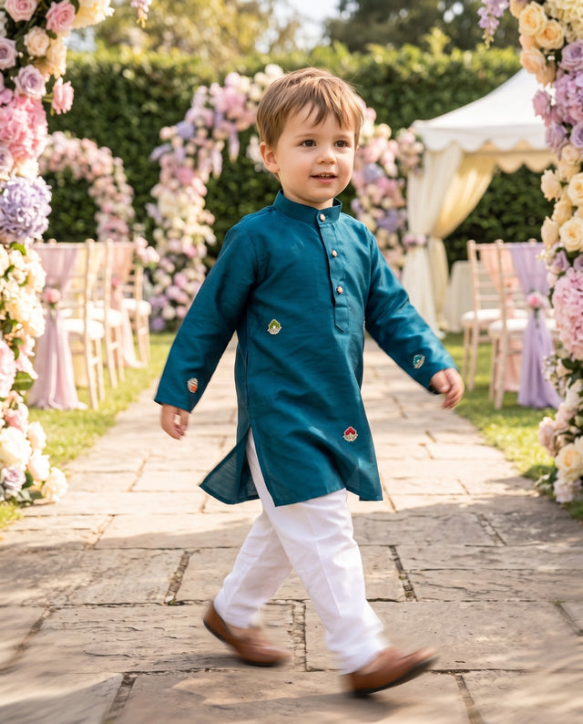 TryBuy teal-blue embroidered boys kurta for ages 2–3, walking side view showing side slit and long sleeves
