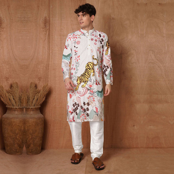 Front view of men's festive Chikankari kurta featuring tiger and floral designs, ideal for weddings and Haldi ceremonies.