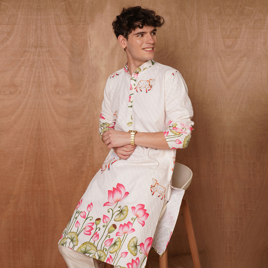 Cream Chikankari Kurta for men with divine cow and lotus motifs, soft cotton blend ideal for traditional and ceremonial occasions.