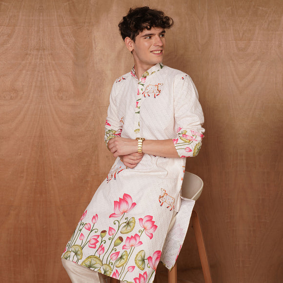 Cream Chikankari Kurta for men with divine cow and lotus motifs, soft cotton blend ideal for traditional and ceremonial occasions.