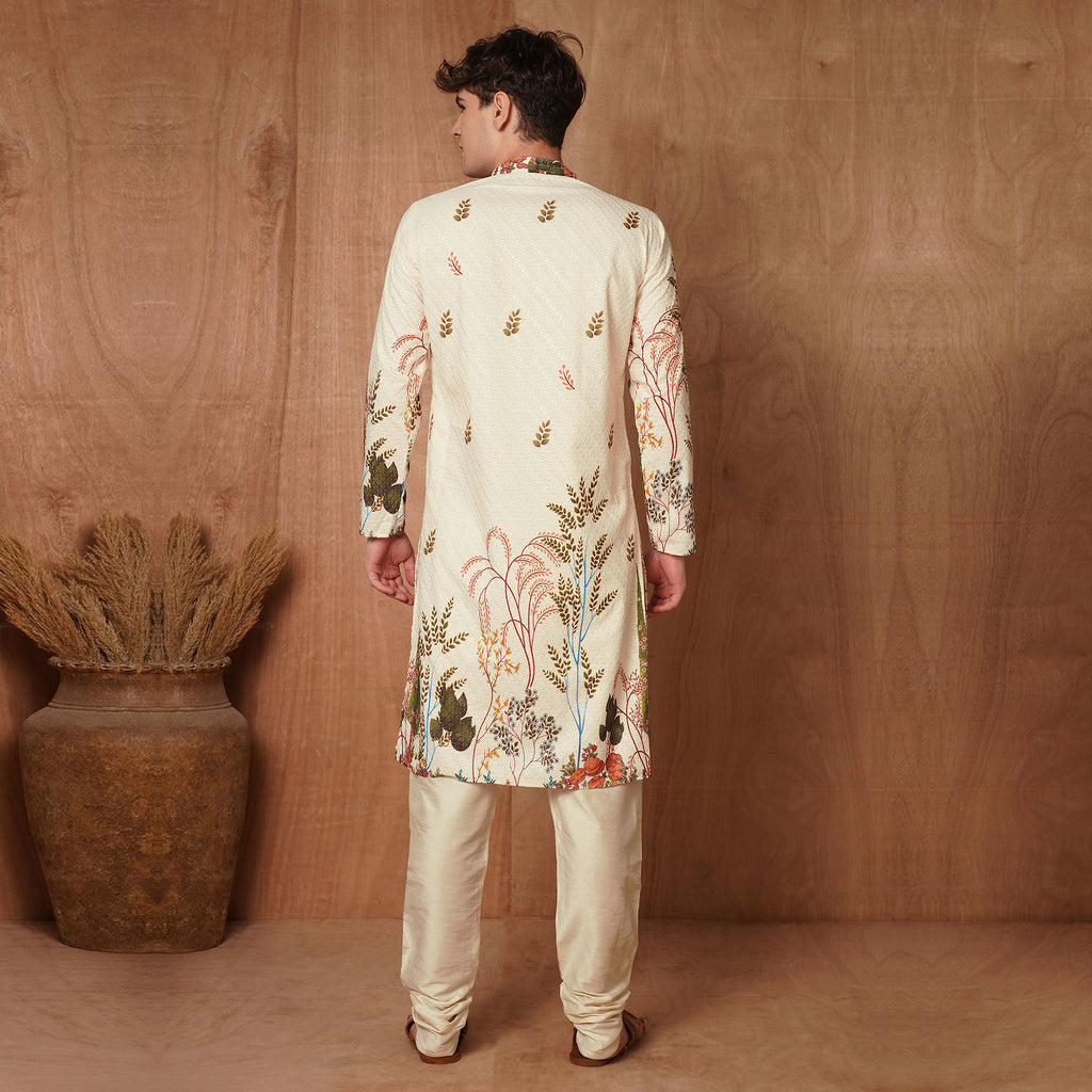 Back view of men's cream Chikankari kurta with artistic nature-inspired print. Elegant ethnic wear for festive and cultural events.