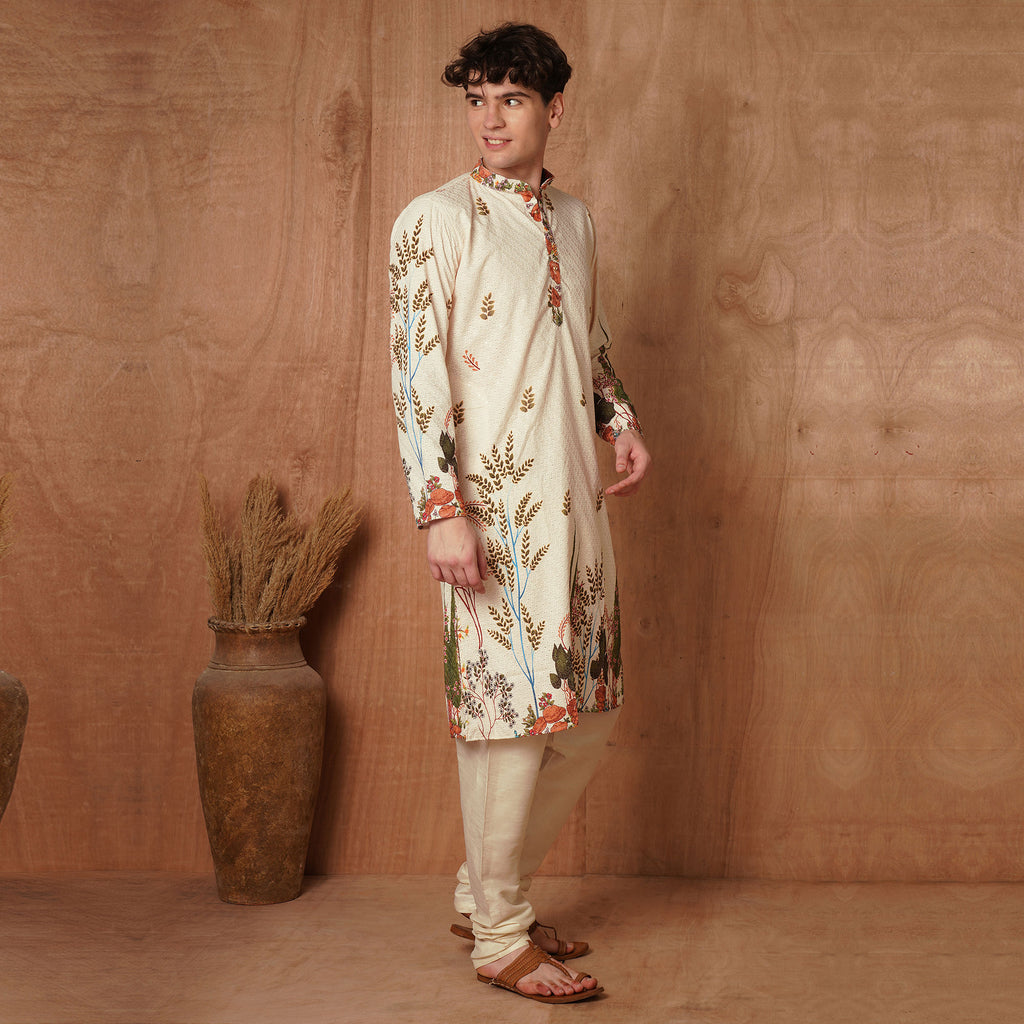 Side view of men's cream Chikankari kurta featuring floral harvest motifs. Stylish traditional attire for weddings and celebrations.