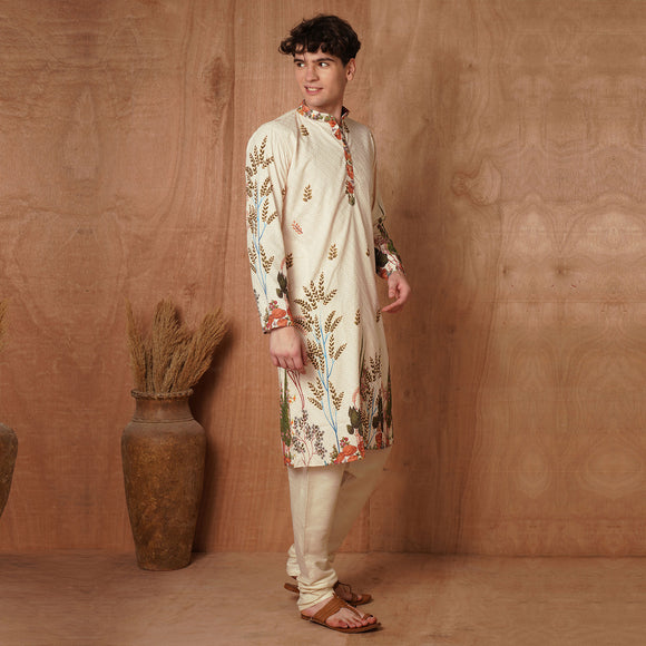Side view of men's cream Chikankari kurta featuring floral harvest motifs. Stylish traditional attire for weddings and celebrations.