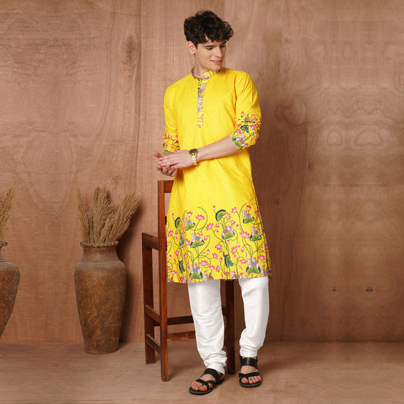 Festive Men’s Yellow Floral Kurta with colorful traditional motifs, ideal for weddings and ethnic occasions.